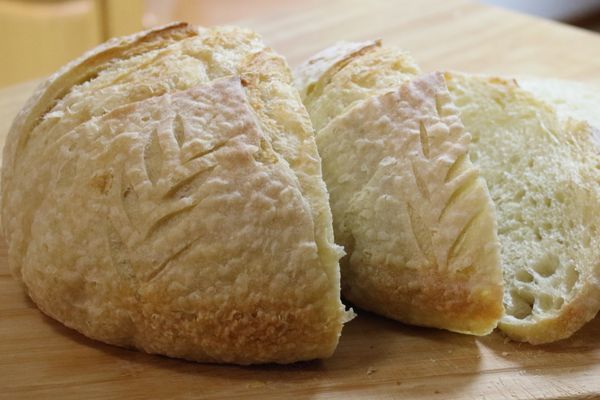 Rustic Baton Cut In Pieces On Cutting Board 